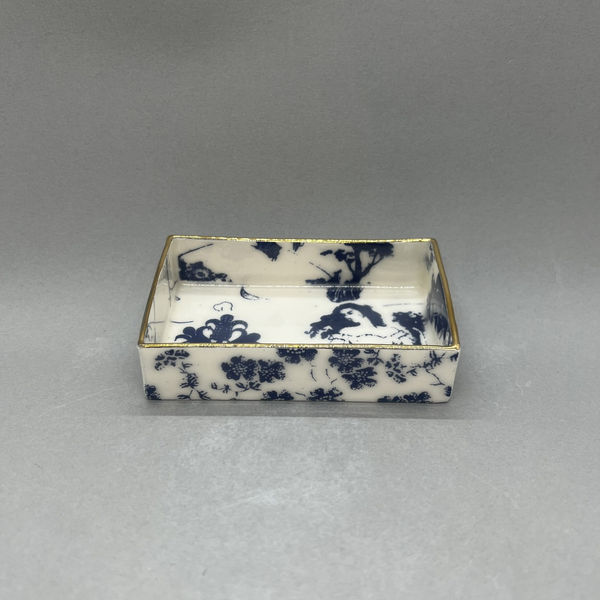 Janine Roper ceramic tray with blue and white floral design and gold rim