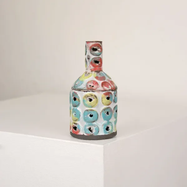 Elly Wall ceramic bottle vase with circular raised patterns in rainbow colours