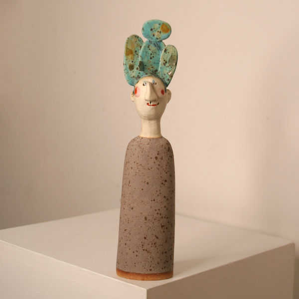 Jane Muir minimalist sculpture of a man, with a cactus tree on his head