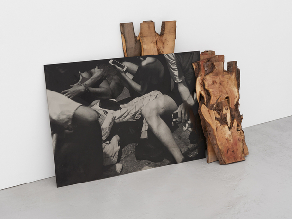 Olu Ogunnaike 05:39_14 October 20182021 (stacked wood sculpture w/ leaning steel print) Charcoal on steel, English yew Print: 26 x 36 5/8 in. / 66 x 93 cm Wood, dimensions variable Largest piece: 33 x 13 3/8 in. / 84 x 34 cm Smallest piece: 15 x 11 in. / 40 x 28 cm