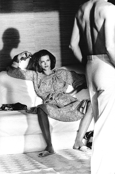 Helmut Newton, Woman examining man, Calvin Klein, American VOGUE, Saint-Tropez, 1975