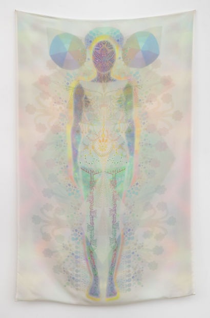 Her legs came straight out of the landscape, all leaves and moss. She brushed them off as if they were...