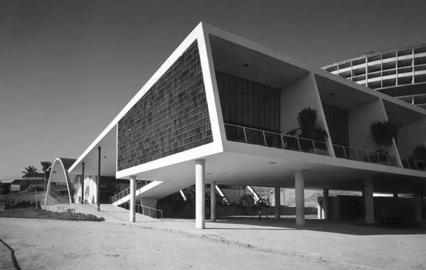 The Pedregulho complex was partially inaugurated in 1950, with construction continuing into the 1960s. The site includes panels by Candido...