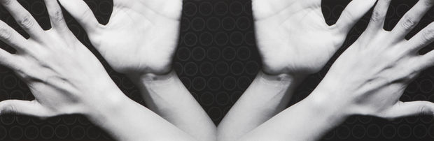 In my artwork I depict a set of open hands that are placed on a background of clocks. The open...