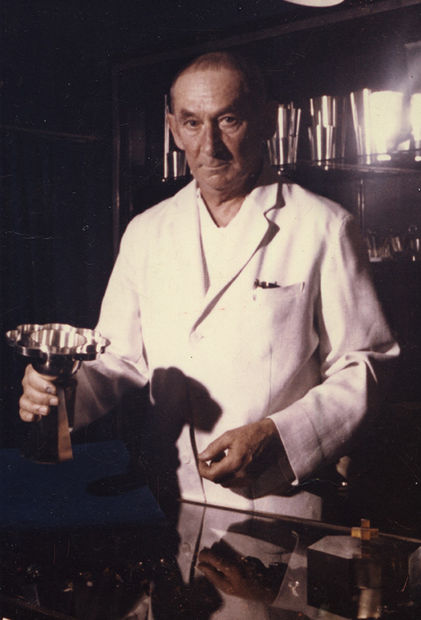 Wiwen Nilsson holding the 1959 communion vessel.