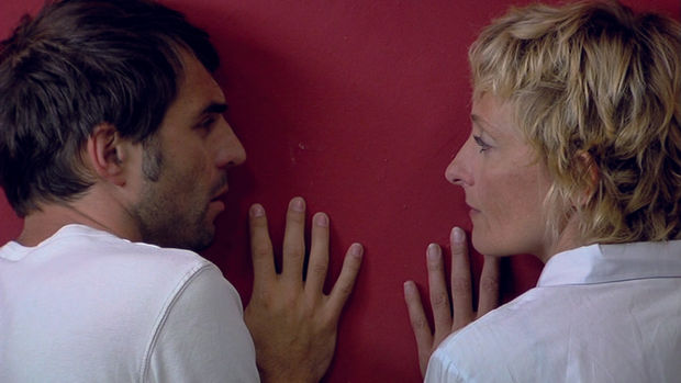 The interwoven stories in Omer Fast's video 'De Grote Boodschap' ('The Big Message') (2007), where six different characters in a...