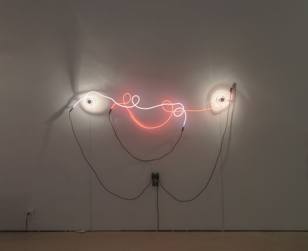 Neon Wrapping Neon with Six Loops (1969) is an example of Sonnier's first neon wall sculptures. Thin orange and pink...