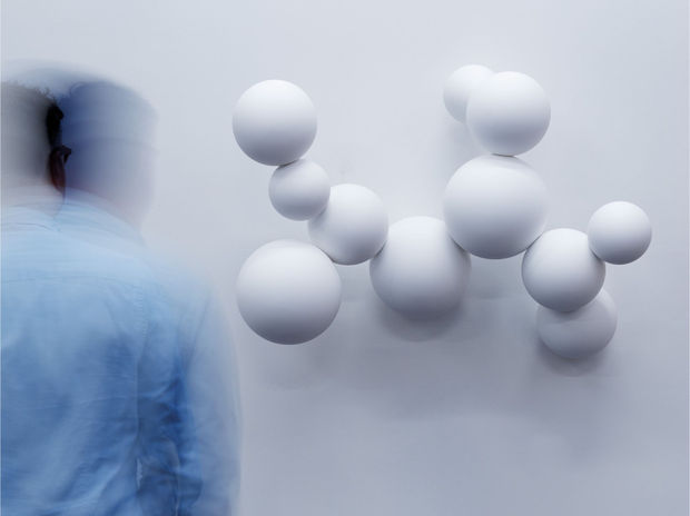 The balloons, now a visual beacon, interact with these settings to emphasize the duality between reality and the reconstruction of...