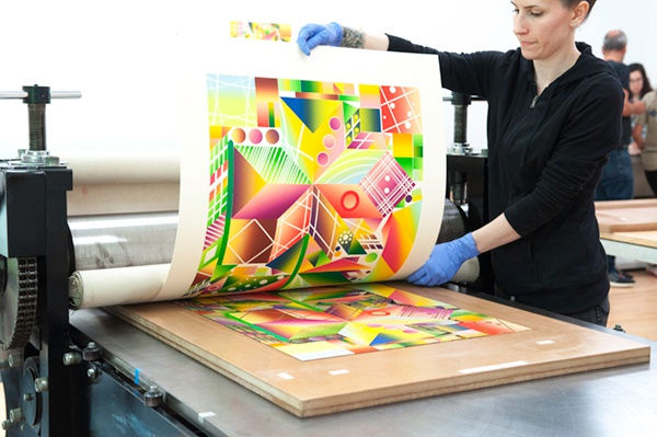 Pulling Polly Apfelbaum's Atomic Mystic Particle woodblock print from an etching press