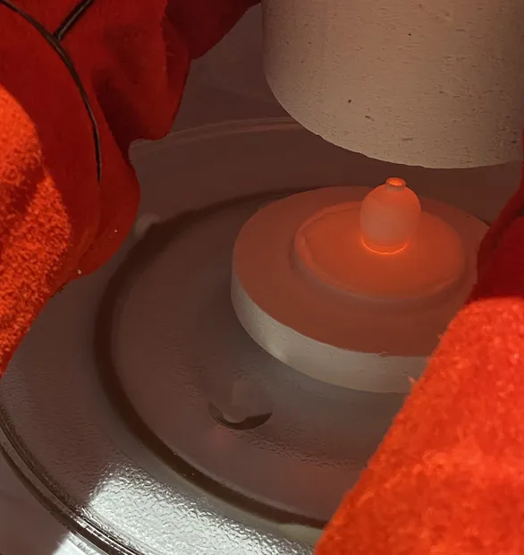 FIRING PROCESS The mini kiln reaches temperatures as high as 1300 C. When firing the vases, the clay turns red-hot....