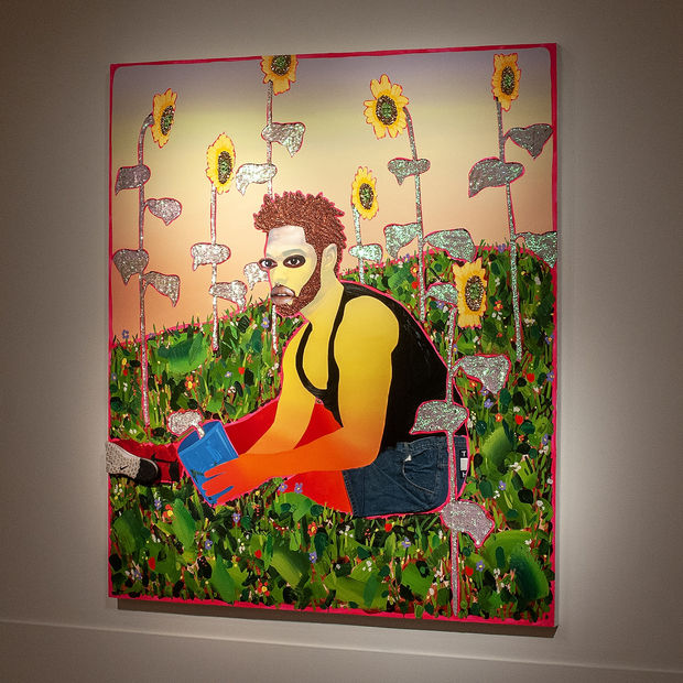 Installation view of Devan Shimoyama's "Potted", showing him gardening in his backyard.