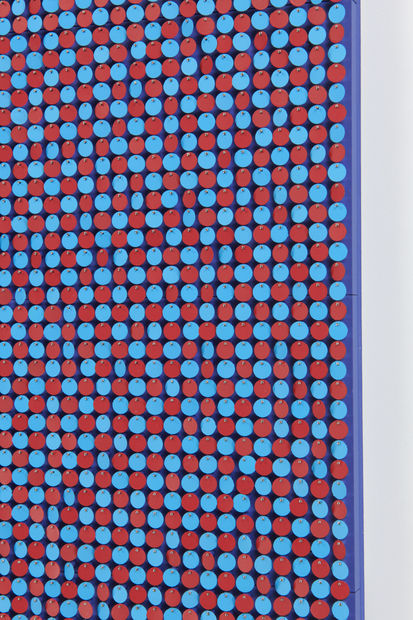 The composition of these works references Pointillism, but as three-dimensional relief sculptures, the light and shadow cast from the discs...