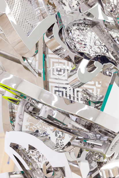 This sculpture, titled Runner, presents a form that is highly abstracted, offering not so much a narrative expression of a...