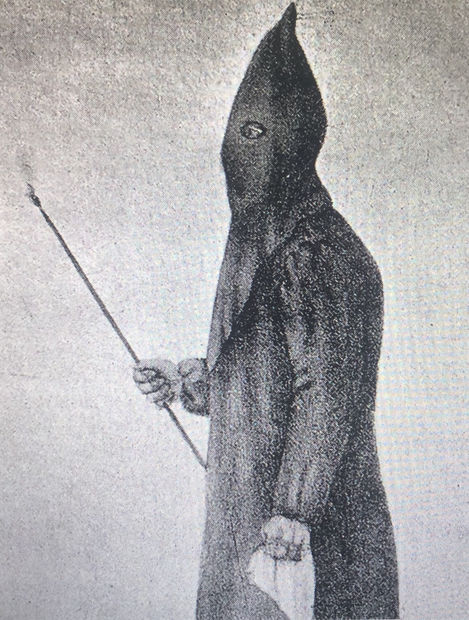 Bosch-like masks, hoods, wide-eyed fear