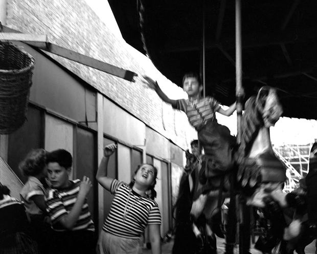 Martin Elkort, Grabbing The Brass Ring, 1950 (Printed Later)