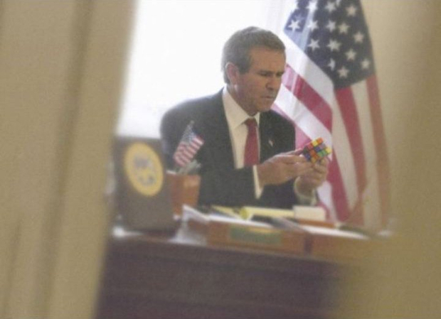 Alison Jackson, Bush plays with Rubik's cube, 2005