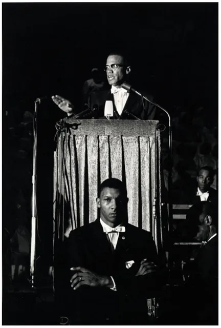 Eve Arnold, American Muslim minister and human rights activist Malcolm X giving a speech at a Nation of Islam rally,...