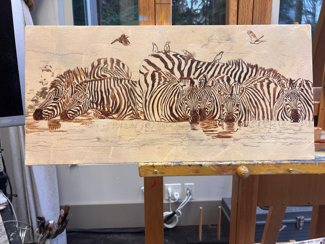 John Banovich
Deep Water Drink, 2026
oil on Belgian linen
11h x 23w in
27.94h x 58.42w x 1.91d cm
$ 16,900.00
&amp;nbsp;

I painted this moment to acknowledge the quiet risk that comes with necessity. The zebras enter water deeper than comfort allows, not out of impulse, but because thirst leaves no alternative. Their bodies are partially surrendered to the river, stripes dissolving into reflection and depth. In this crossing, balance replaces speed, and stillness becomes survival. I was drawn to the tension between need and danger, the way life in the wild is often sustained not by abundance, but by calculated exposure.