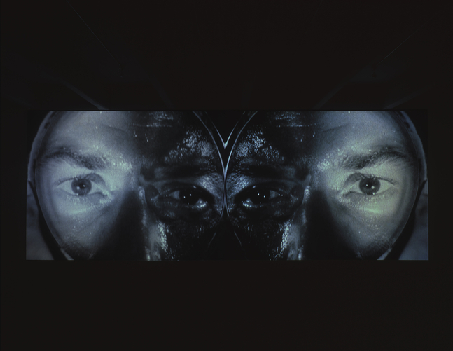 Installation view of video work by Douglas Gordon