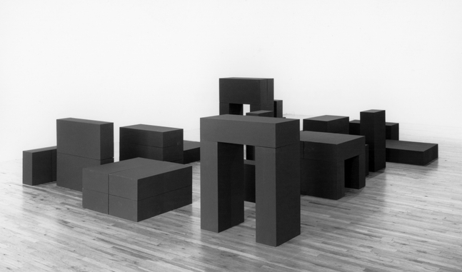 Plywood, painted black, 19 stacked units comprising 39 elements, overall: 40 ft. &amp;times; 20 ft. (12.19 &amp;times; 6.1 m), one-third scale.&amp;nbsp;Carl Andre, Donald Judd, Tony Smith. Paula Cooper Gallery, New York, 1984