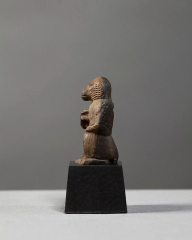 Egyptian amulet of Thoth holding an udjat-eye, Late Dynastic Period, Saite Period, 26th Dynasty, c.664-525 BC