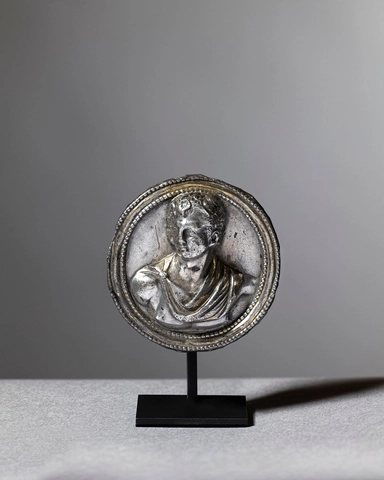 Roman medallion of a young man in relief, c.1st century AD