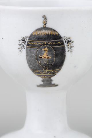 THREE UNUSUAL CHINESE ARMORIAL EGG-CUPS, Qianlong (1736-1795)