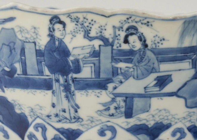 A CHINESE BLUE AND WHITE LOTUS-MOULDED BOWL, Kangxi 1662-1722