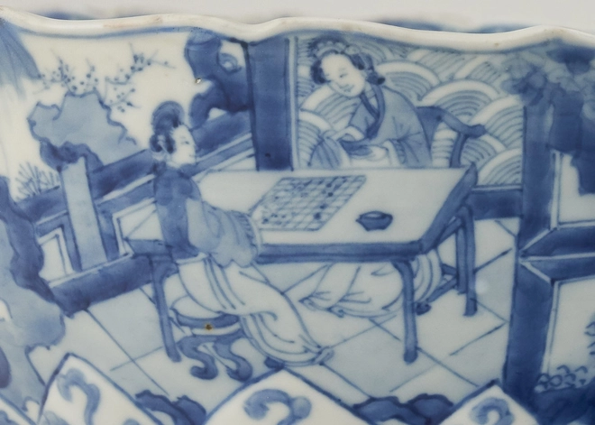 A CHINESE BLUE AND WHITE LOTUS-MOULDED BOWL, Kangxi 1662-1722