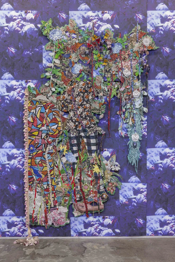 Ebony G. Patterson ...they waited...for those who bear/bare witness, 2018 Hand-cut jacquard woven photo tapestry with glitter, appliqués, beads, trim, brooches, feathered butterflies, fabric, on artist-designed fabric wallpaper 115 x 72 in. 292.1 x 181.6 cm Notes: 9.6 x 6 feet