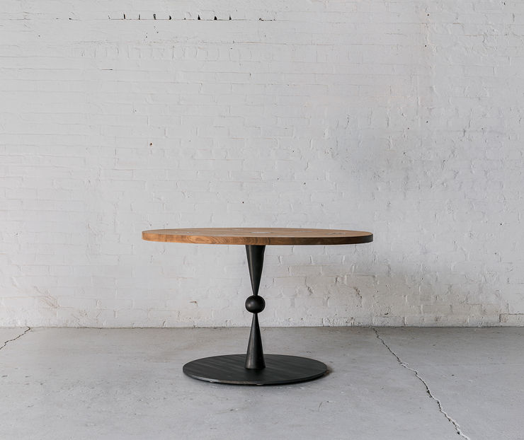 Hatfield Table Bleached walnut, brass patches and blackened brass base 29 x 48 x 48 inches
