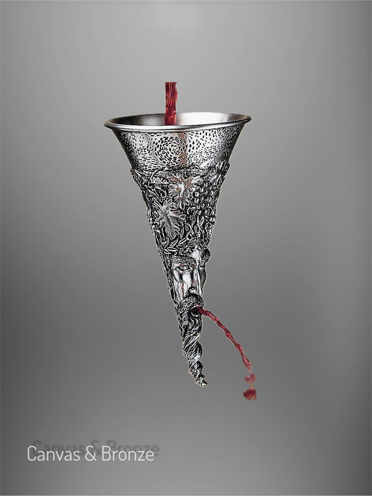 Intricately detailed silver chalice with a flowing red liquid against a gray background.