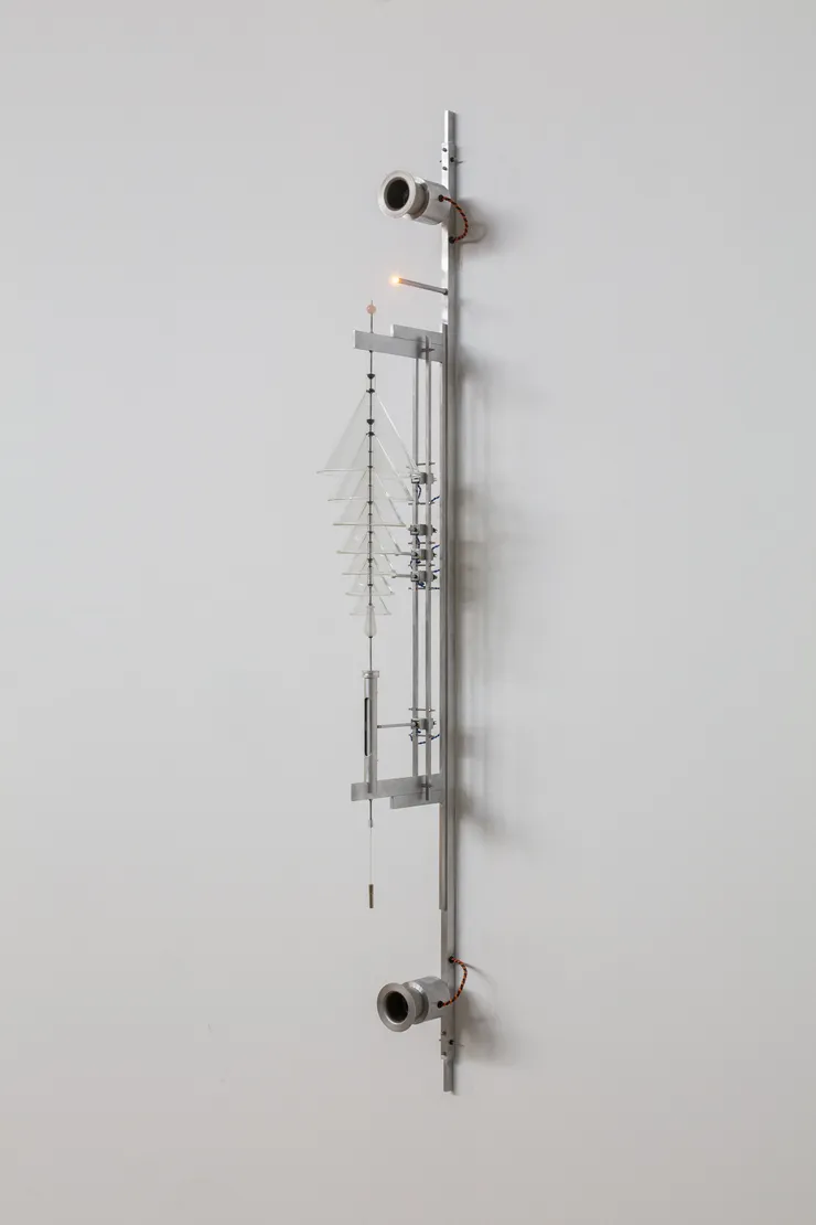 Lucas Cant&uacute; Llama Ahora / Call Now, 2022 Glass, Cables, Stainless Steel. Electro-mechanical bell piece composed of two parts, 1. On the outside a controller with pushbutton panel 2. On the inside an instrument composed of various sound devices is activated by the external pushbutton panel sounding the bell Controller: 10 x 18 x 0.6 cm (3.94 x 7.08 x 0.24 in) Instrument: 150 x 15.2 x 26 cm (59.06 x 5.98 x 10.24 in)