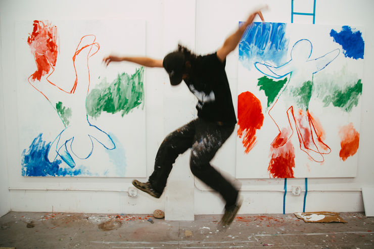 brendan lynch in his studio with artwork