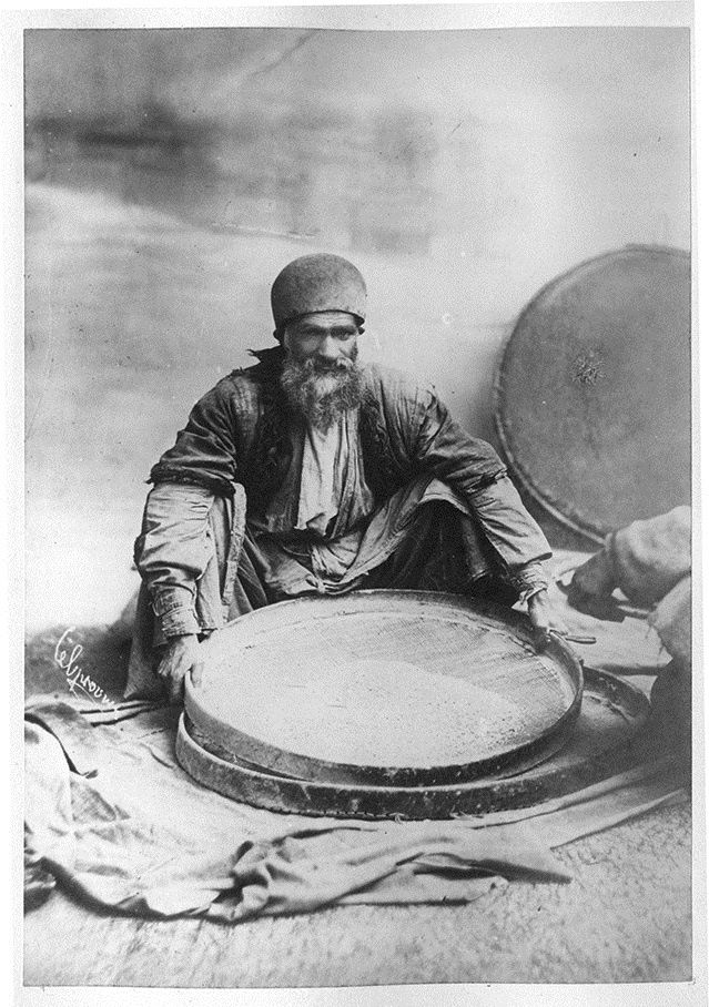 Antoin Sevruguin, A man in Tehran with wheat, Late 19th Century