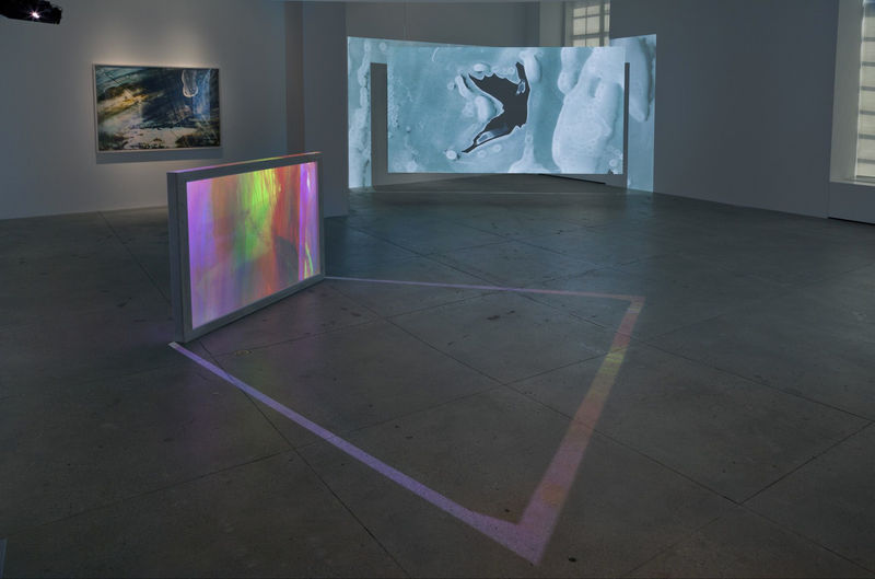 Matt Saunders Poelzig / The Intricate Alps 3 channel HD video projection, custom screens; 24 min. looped Small projection: 8...