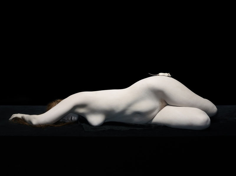 Nadav Kander Isley lying with white mouse on hip, 2012