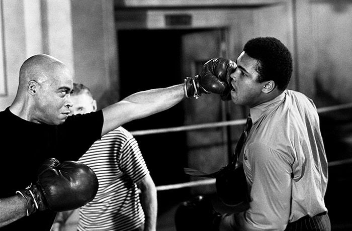 Lawrence Schiller James Earl Jones Takes a Swing at Ali, c. 1968 Archival pigment print 16 x 20" Edition of 35 Signed and numbered in ink on sheet recto