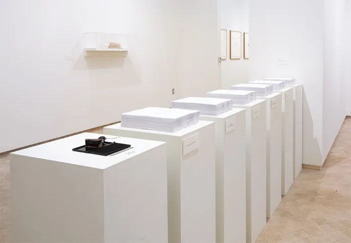 Luis Camnitzer, "Selbstbedienung (Self-Service)," 1996/2010, photocopies, rubber stamp, ink pad, wooden bases, dimensions variable.