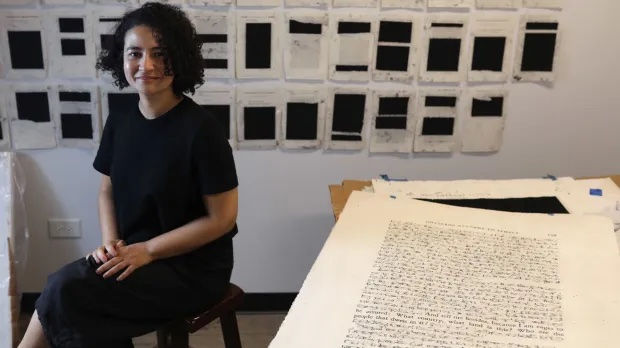 "Someone (told) me some of my erasure looks 'aggressive,' but it doesn't feel that way to me," says artist Bethany Collins.