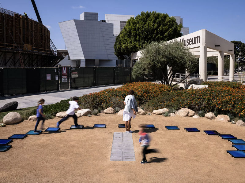 Visitors engage with Chloë Bass’ sculptural installation “#sky #nofilter: Hindsight for a Future America” at CAAM. The work is an analemmatic sundial. (Photo: Elon Schoenholz; from CAAM)