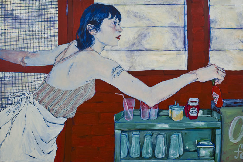 Woman, with her arm stretched out, leans over a cart with different jars and bottles on it