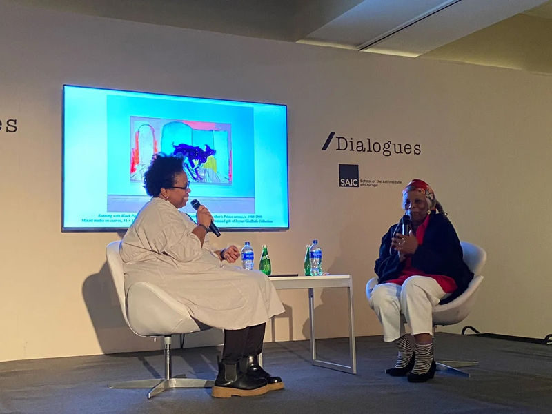 Curator Jamillah James, left, in conversation with artist Mary Lovelace O'Neal, at Expo Chicago 2022. MAXIMILÍANO DURÓN/ARTNEWS