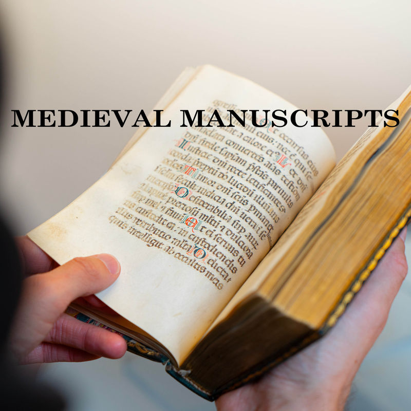 Image a person holding in his hands a rare illuminated manuscript from the Middle Ages.