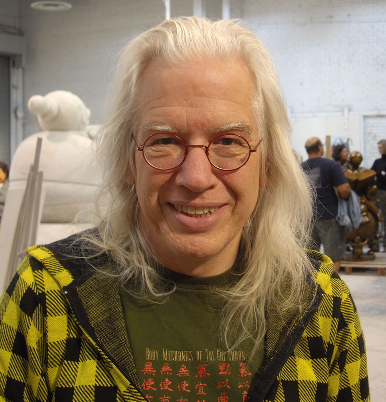 Image Credits: Tom Otteness in his studio in Brooklyn, NY (2008), photo by Dmadeo, licensed under CC BY-SA 3.0 (https://creativecommons.org/licenses/by-sa/3.0/), via Wikimedia Commons.