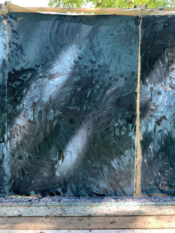 Work in progress of large painting in a garden studio