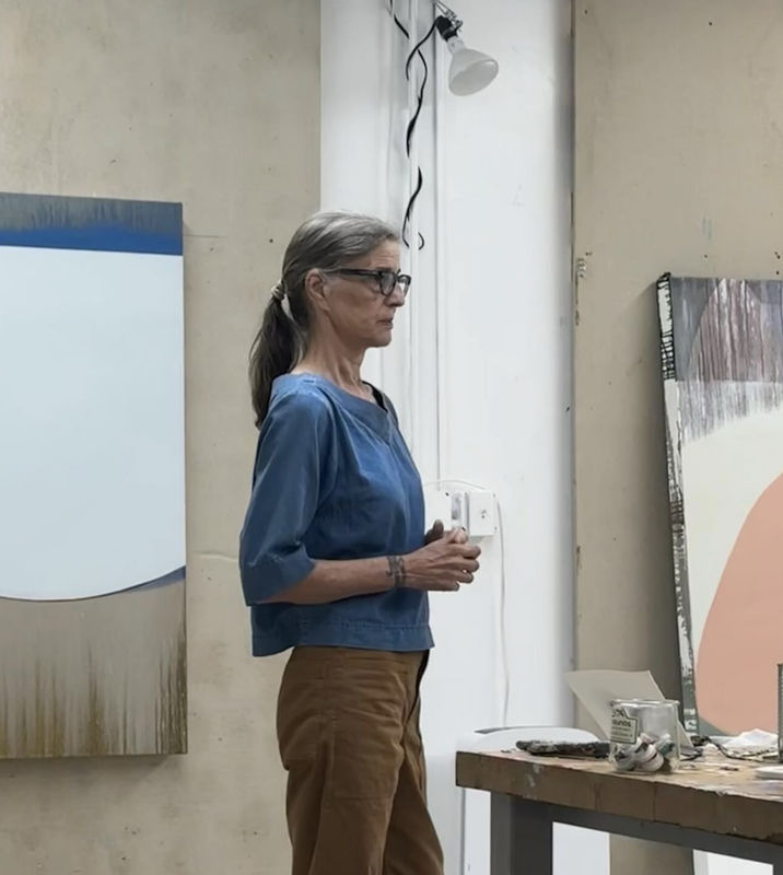 Portrait of Sarah in her painting studio