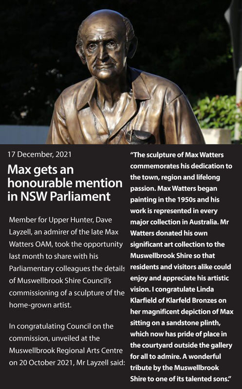 An article titled "Max gets an honourable mention in NSW Parliament," dated 17 December 2021, featuring a bronze sculpture of Max Watters, a late artist, sitting on a sandstone plinth. The sculpture commemorates his dedication to the town, region, and lif