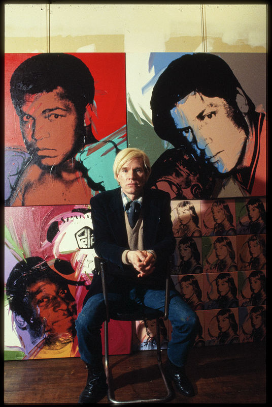 Andy Warhol in front of paintings from his 'Athletes' Series. Photo: Bernard Gotfryd | Library of Congress