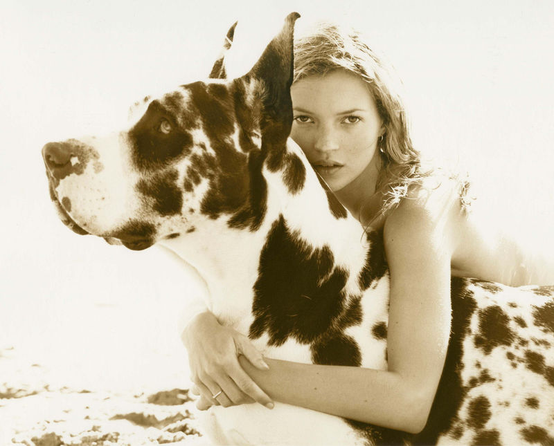Herb Ritts photograph of Kate Moss hugging a large dog